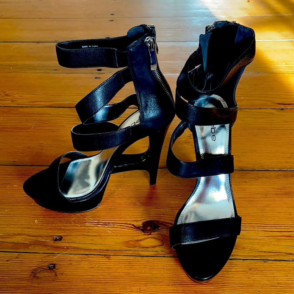 Stunning Bebe platform stilettos.